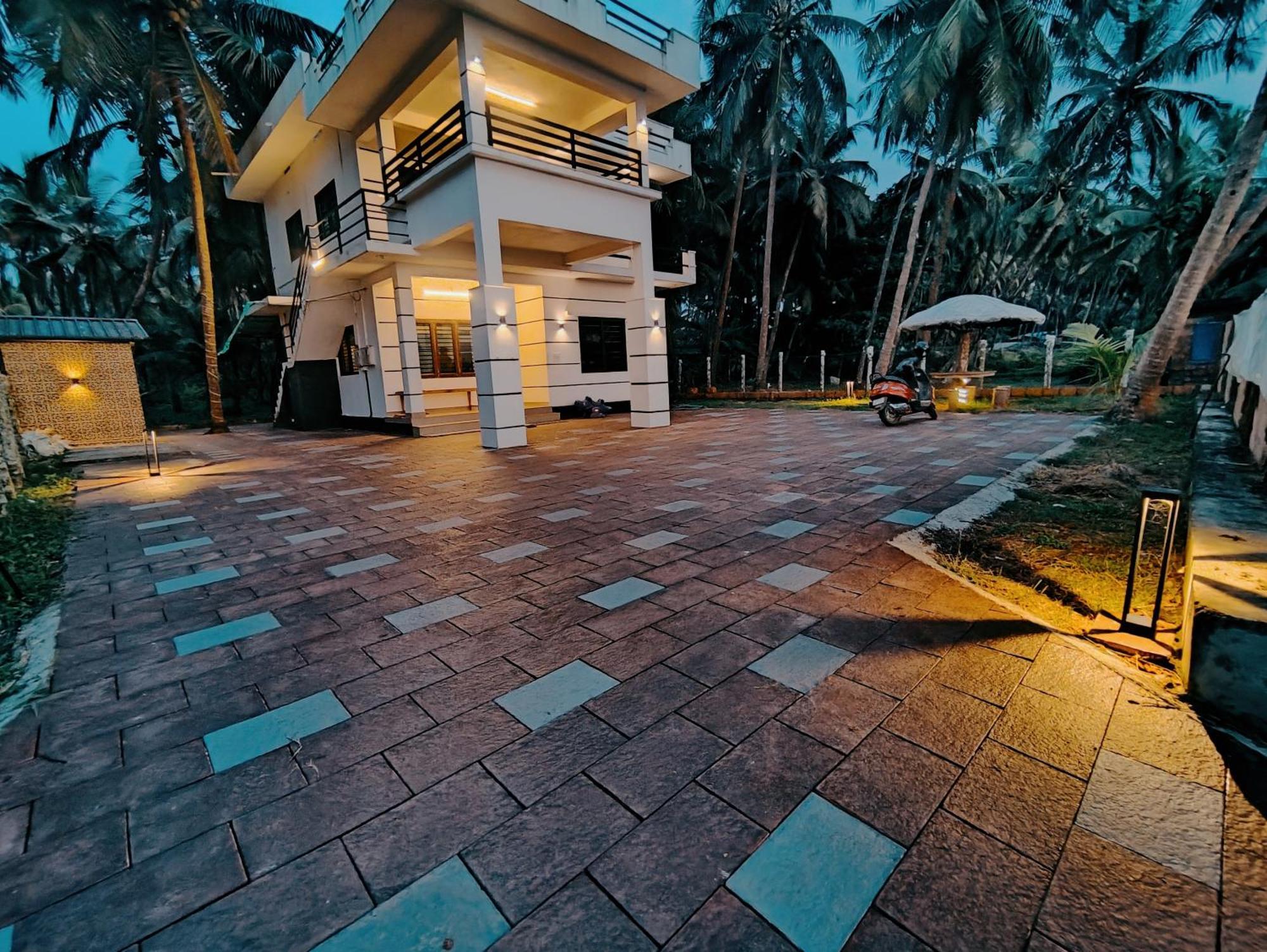 Corniche Beach Resort Mulappilangād Camera foto